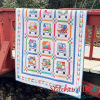Loads of Fun Quilt on a Bridge