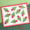 Christmas Tree Toss Mug Rug by Stitches of Love Quilting